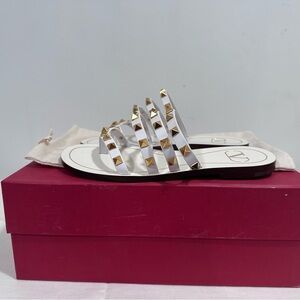 Stylish White Sandals with Gold Accents